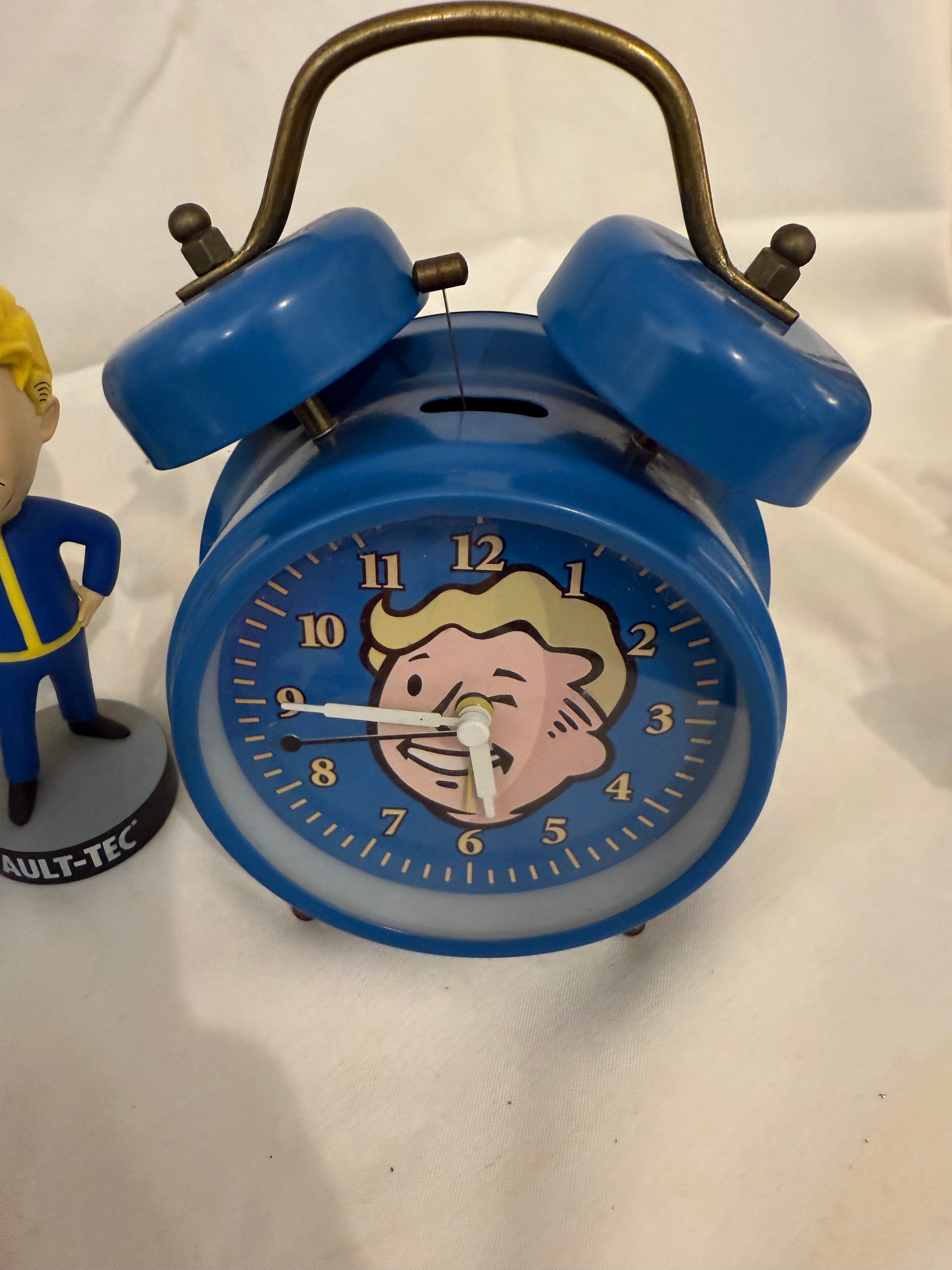 Fallout Cookbook, Nuka Cola checkers, Fallout alarm clock and 3 Vault Tec bobble heads