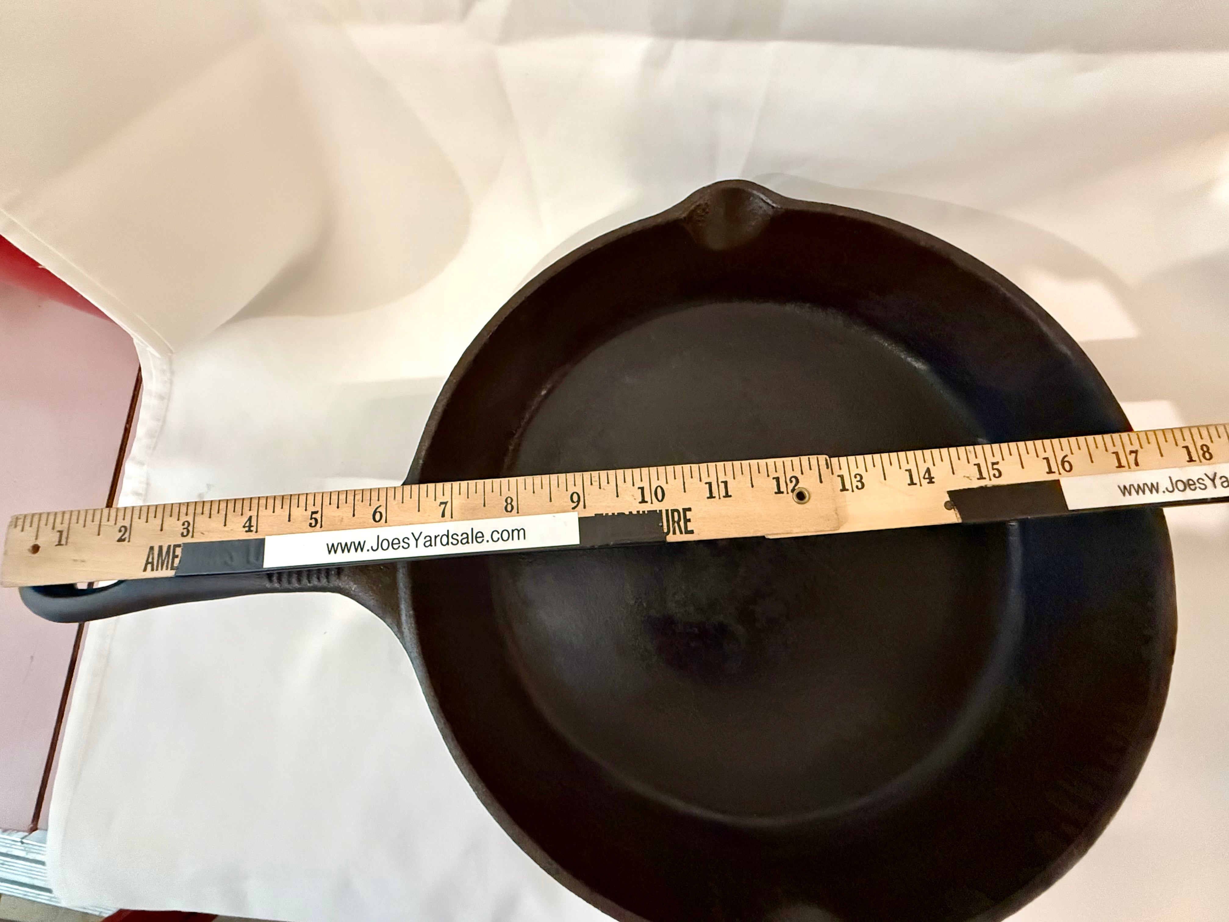 12” cast iron skillet, well used and seasoned