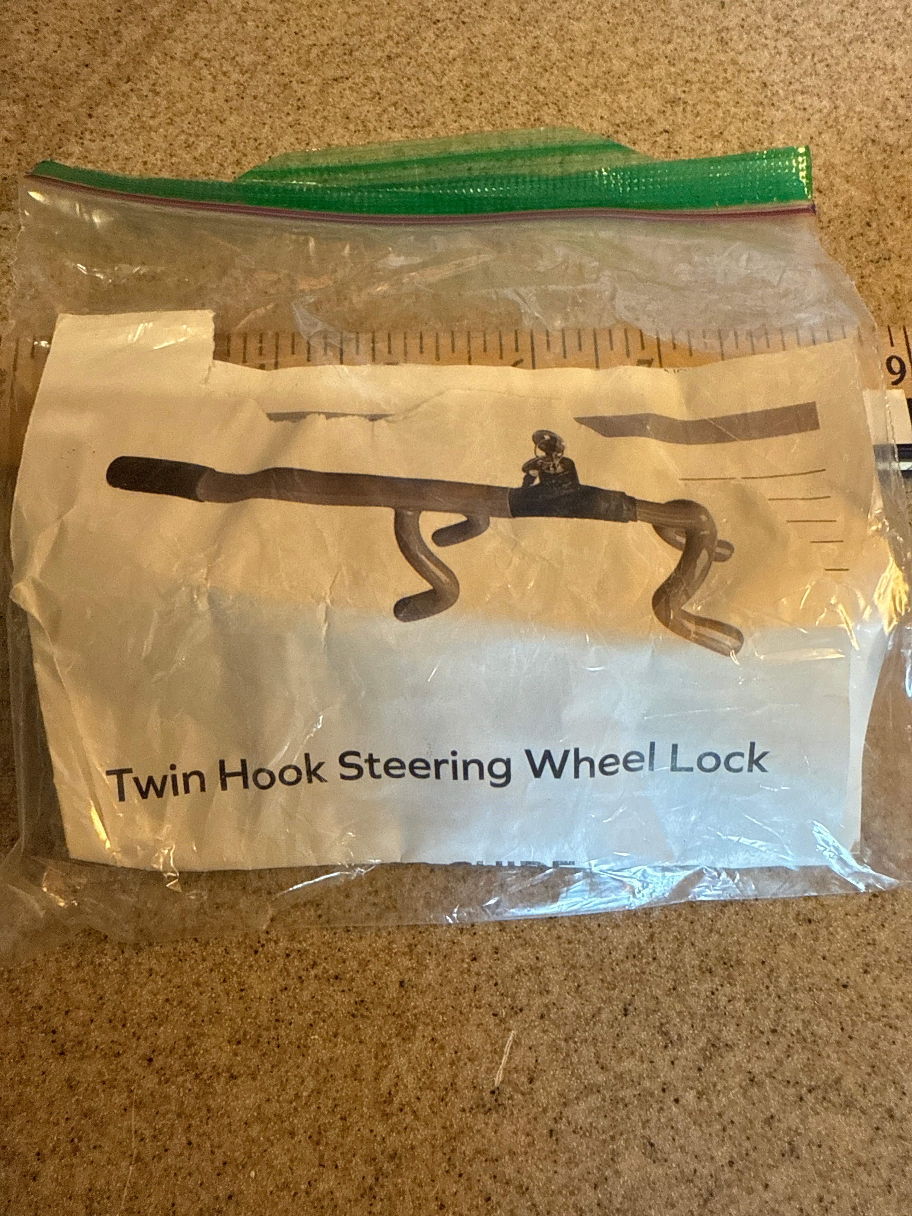 Twin hook steering wheel lock