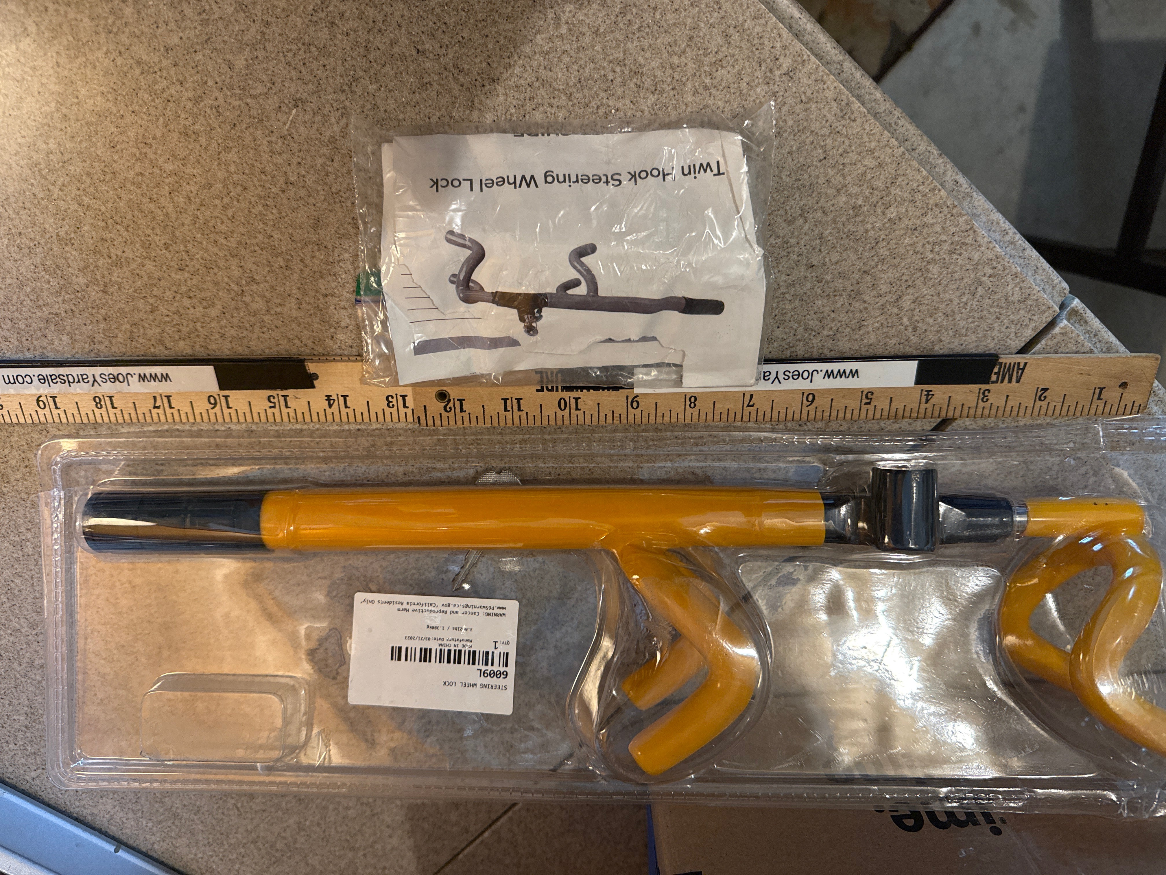 Twin hook steering wheel lock