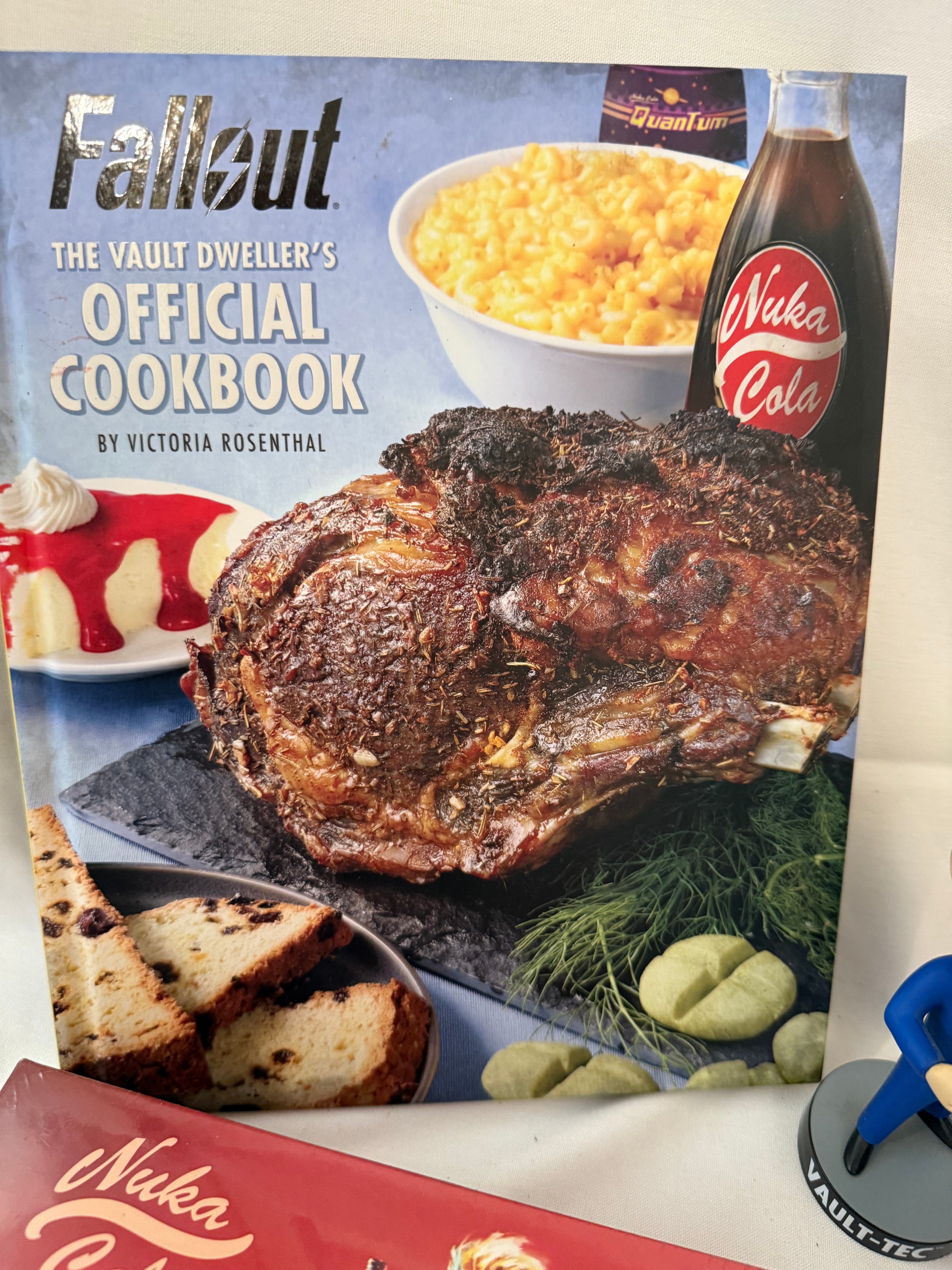 Fallout Cookbook, Nuka Cola checkers, Fallout alarm clock and 3 Vault Tec bobble heads