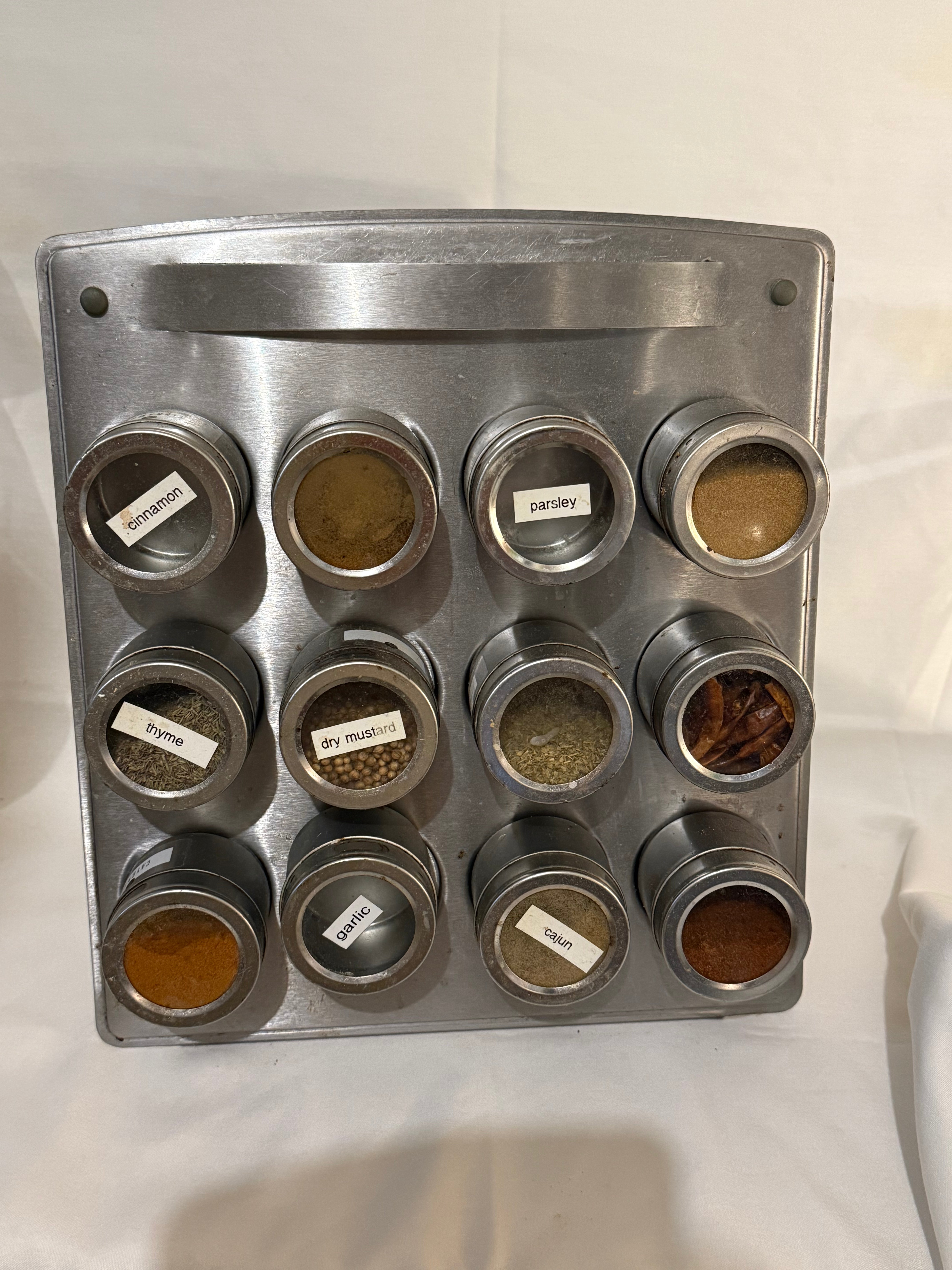 Magnetic Spice tins with holder display and some spices