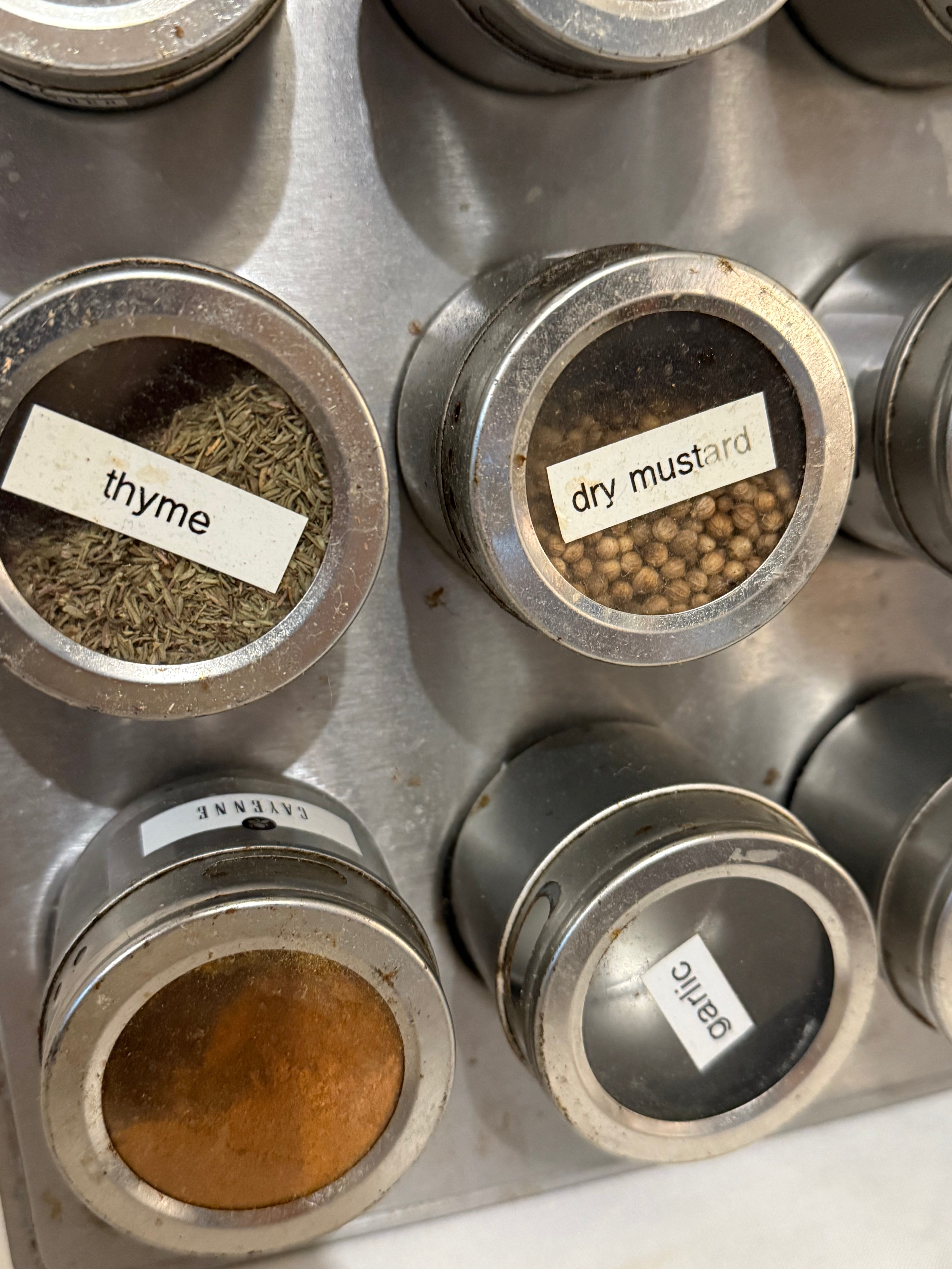 Magnetic Spice tins with holder display and some spices