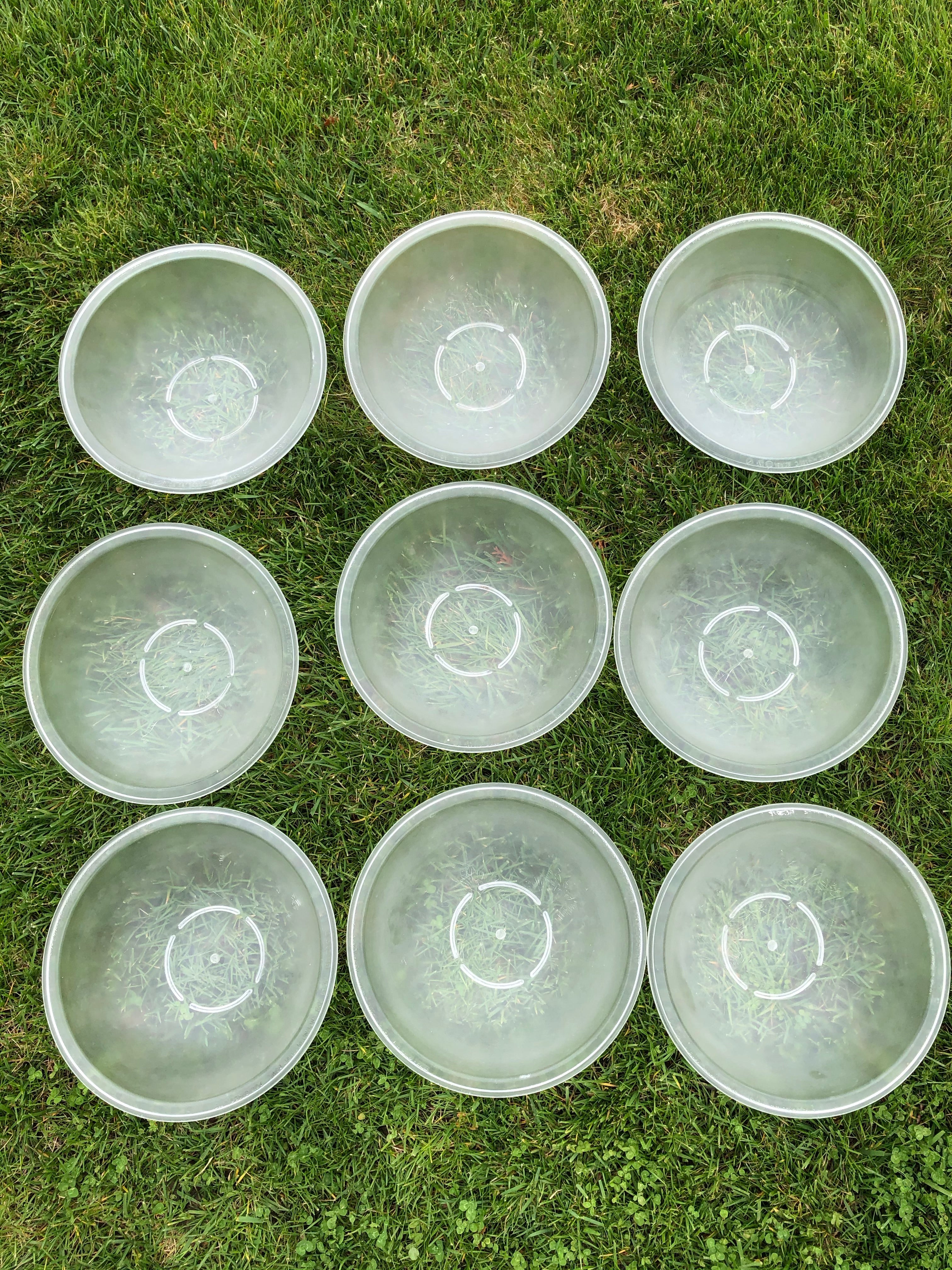 9 plastic salad bowls, appx 11 inches