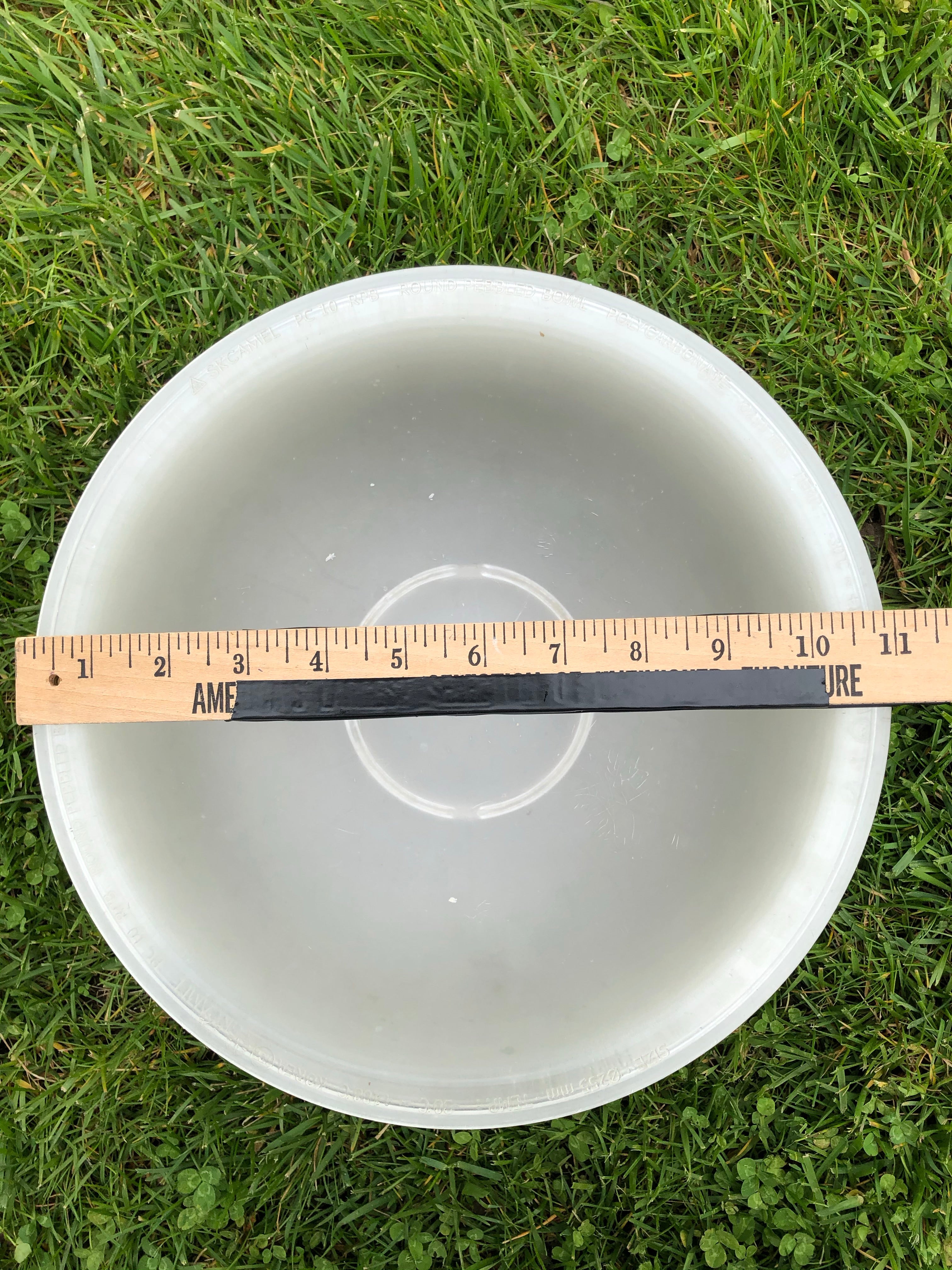9 plastic salad bowls, appx 11 inches